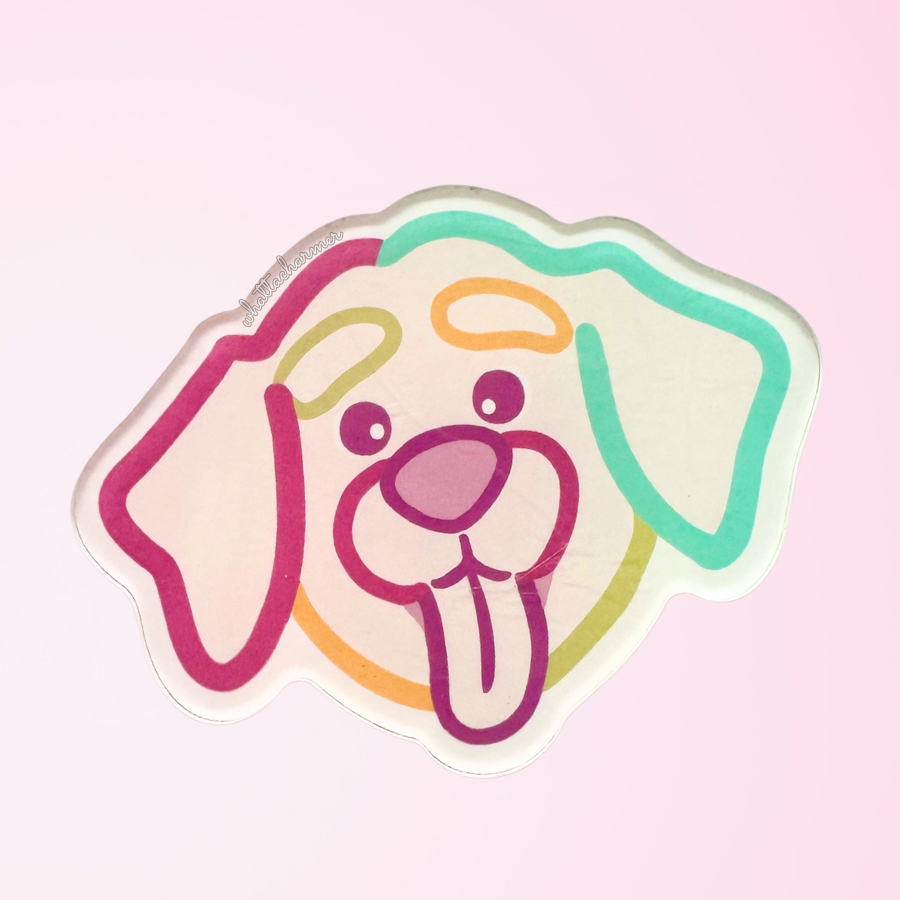 Cartoon labrador retriever dog face with colorful outlines on a pink background