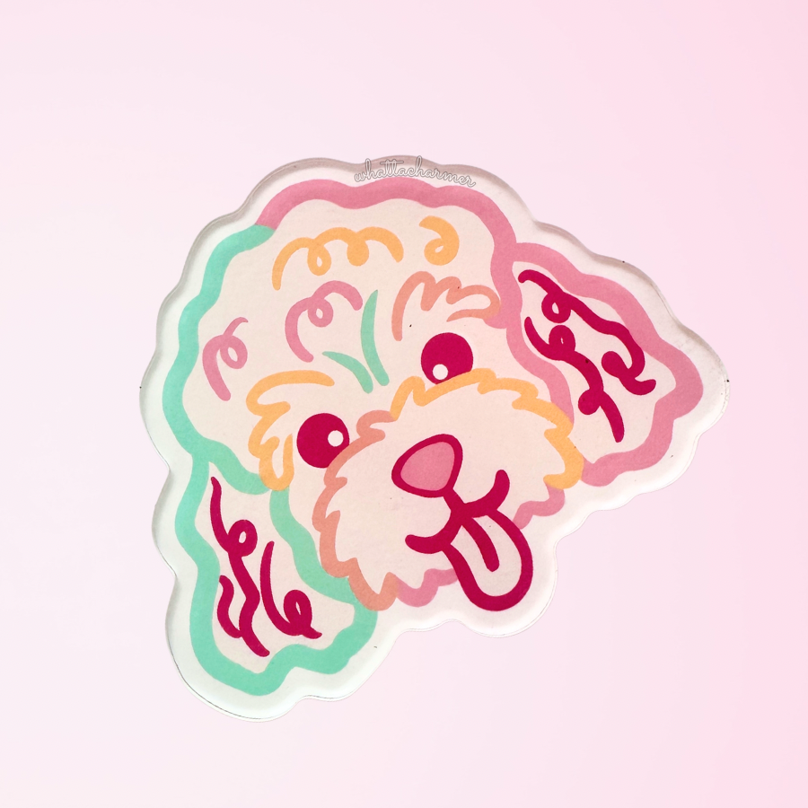 Cartoon toy poodle dog face with colorful outlines on a pink background
