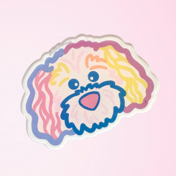 Cartoon goldendoodle dog face with colorful outlines on a pink background
