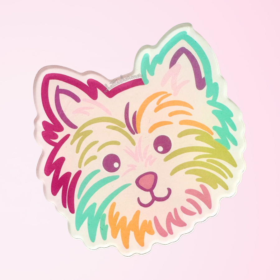Cartoon Yorkshire terrier dog face with colorful outlines on a pink background