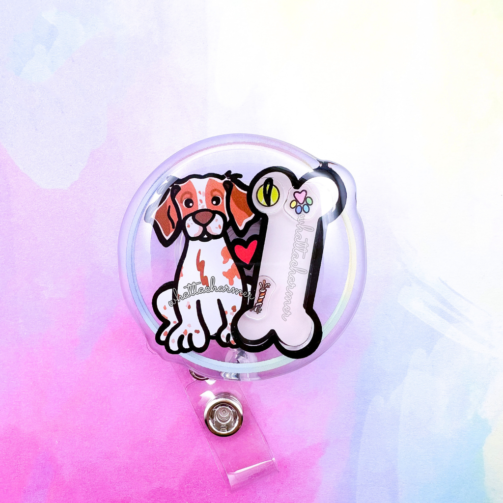 Orange and White Brittany Spaniel Shaker Badge Reel
