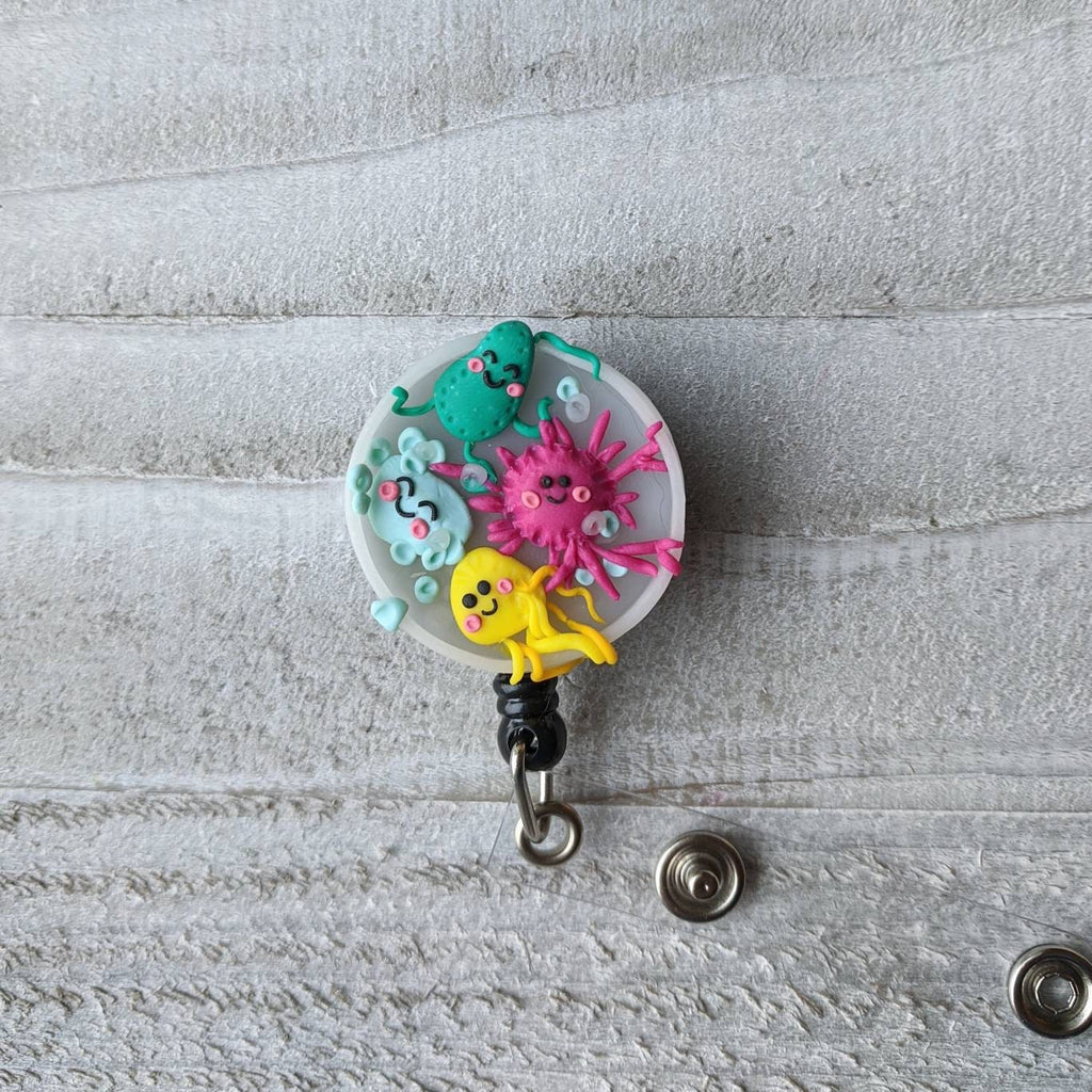 Wiggling Bacteria Petri Dish Badge Reel